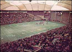 Sold out stadium at a football game in the UNI-Dome.