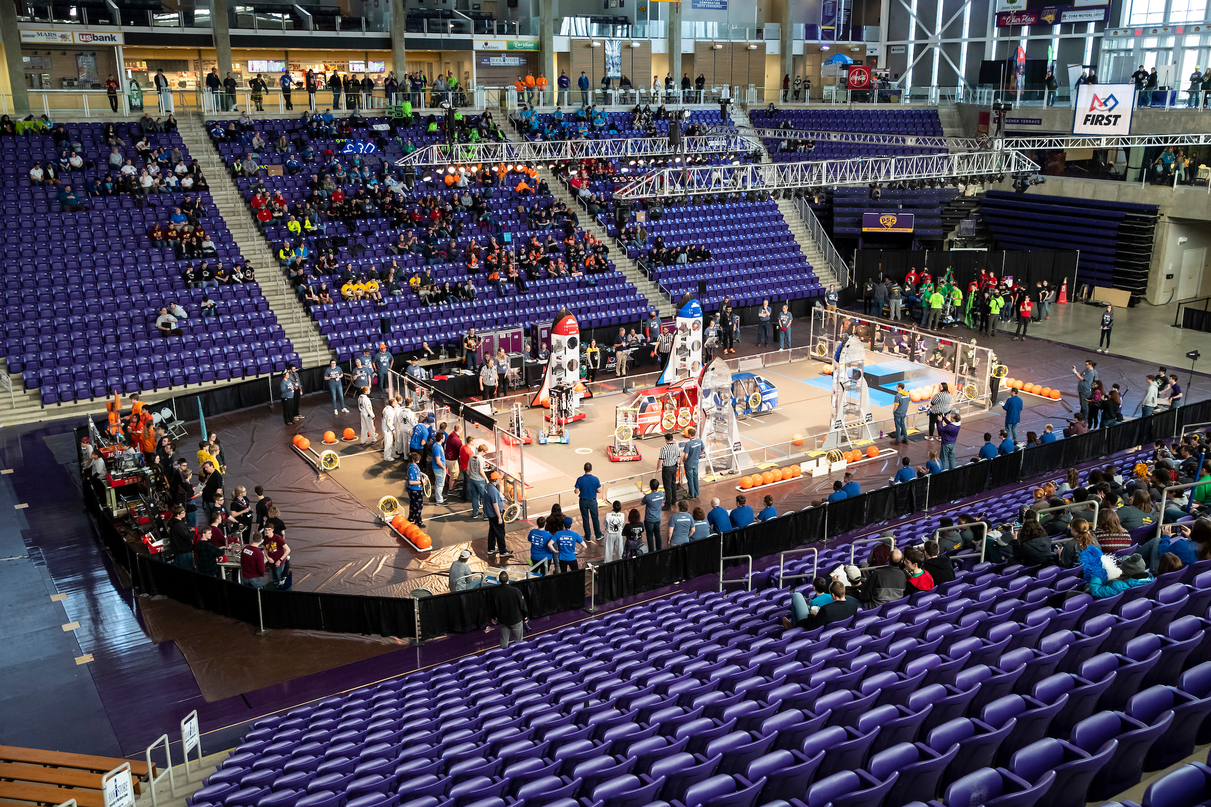 STEM robitics competition on the event floor of the McLeod Center.